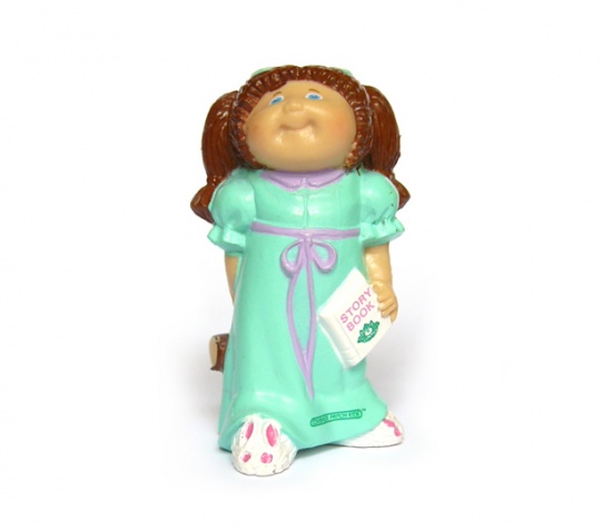 Cabbage Patch Kids figure brunette with story book
